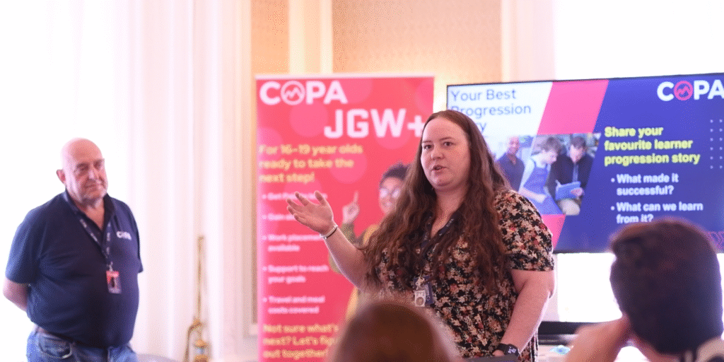 Jobs Growth Wales+ tutor Hannah Johnson delivering a talk at an event.